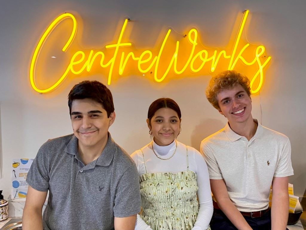 Centreworks Urban Innovation Team standing in front of a Centreworks sign