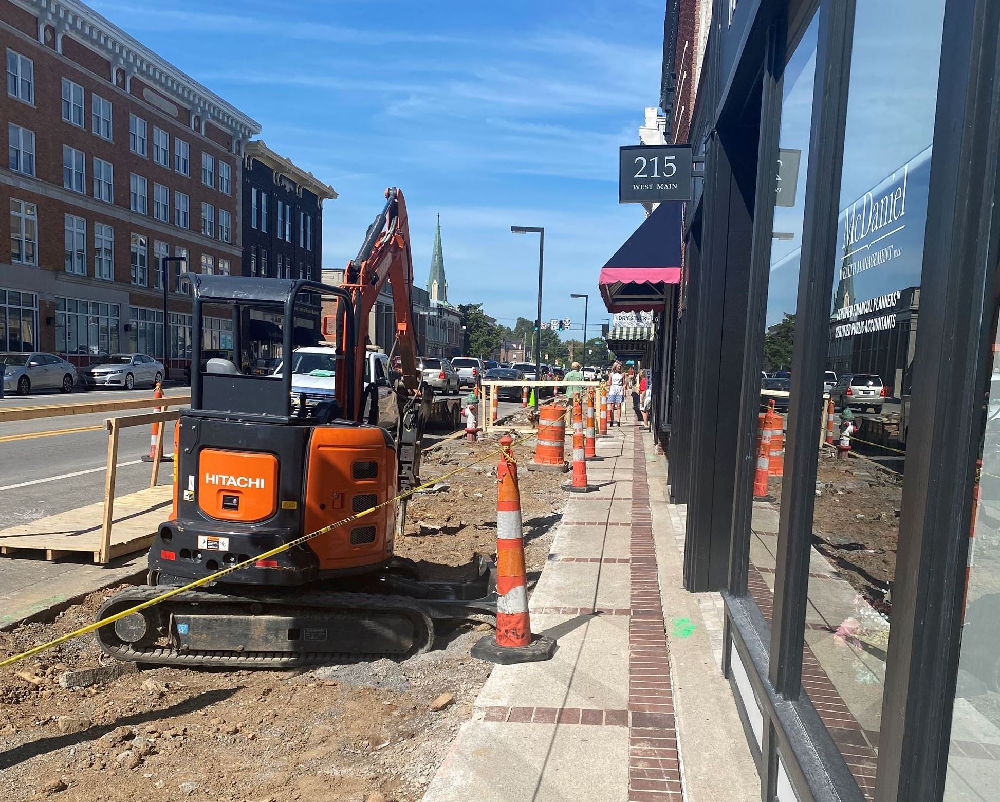 Photo of demolished sidewalk on Main Street